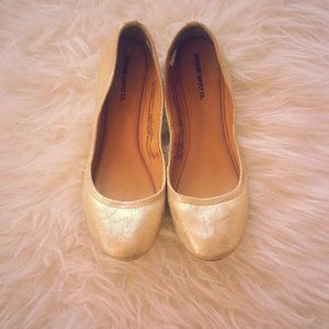 flat golden shoes